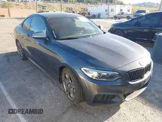 2016 BMW 2 Series M235i with VIN WBA1J7C53GV360553, listed as a IAAI auction lot 41561144 with 1 mi miles. Bid and sale history available at carsss.com. Image 1.