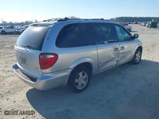 2005 Dodge Caravan SXT with VIN 2D4GP44L45R477780, listed as a IAAI auction lot 41654075 with 166,060 mi miles. Bid and sale history available at carsss.com. Image 4.