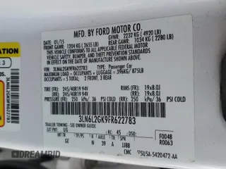 2015 Lincoln MKZ z VIN 3LN6L2GK9FR622783, wystawiony jako Copart lot #59892995 z przebiegiem 174 209 mil mil oraz Szkoda całkowita • Salvage title. Historia ofert i sprzedaży dostępna na DreamBid. Obrazek 12.