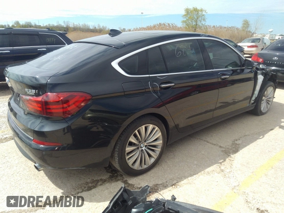 2015 BMW 5 Series 535i Gran Turismo xDrive with VIN WBA5M4C53FD184034, listed as a IAAI auction lot 34956880 with 86,657 mi miles and . Bid and sale history available at DreamBid. Image 4.