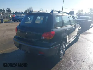 2004 Mitsubishi Outlander LS with VIN JA4LX31FX4U003476, listed as a IAAI auction lot 41290028 with 206,940 mi miles. Bid and sale history available at carsss.com. Image 4.