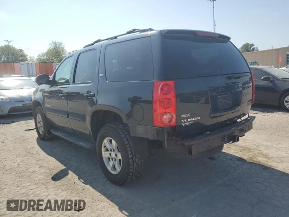 2007 GMC Yukon SLT with VIN 1GKFK13057J345796, listed as a Copart auction lot 71773124 with 218,788 mi miles and Salvage Title. Bid and sale history available at DreamBid. Image 2.