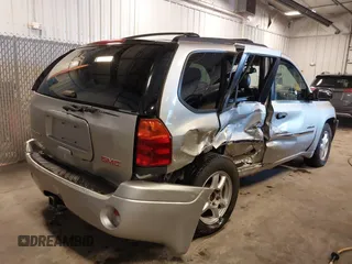 2006 GMC Envoy SLT with VIN 1GKDT13S262285832, listed as a IAAI auction lot 41794016 with 177,814 mi miles and . Bid and sale history available at DreamBid. Image 4.