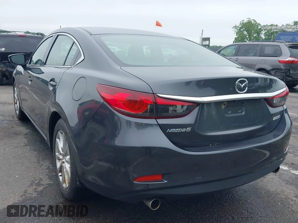 2014 Mazda 6 i Sport with VIN JM1GJ1U52E1102800, listed as a IAAI auction lot 42266283 with 103,886 mi miles and . Bid and sale history available at DreamBid. Image 3.