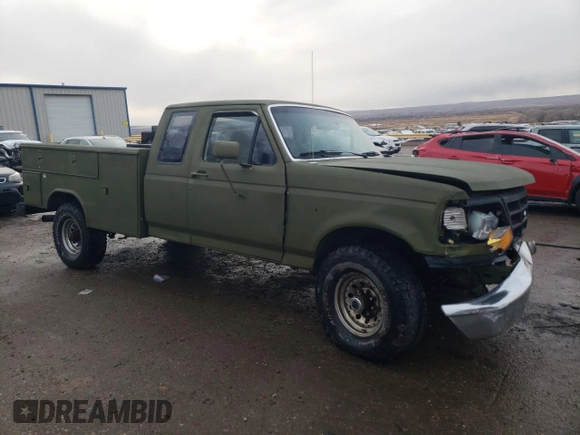 1992 Ford F-250 with VIN 1FTHX26M6NKA32015, listed as a Copart auction lot 87720755 with 226,056 mi miles and Salvage Title. Bid and sale history available at carsss.com. Image 4.