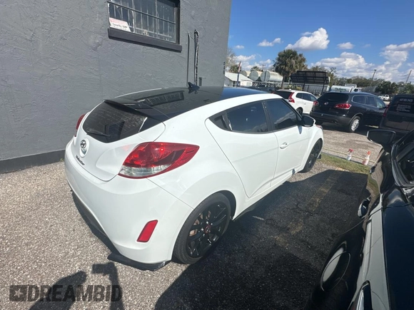 2012 Hyundai Veloster w/Gray Int with VIN KMHTC6AD6CU036826, listed as a Copart auction lot 45042645 with 169,498 mi miles and Clean title. Bid and sale history available at DreamBid. Image 4.