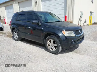2007 Suzuki Grand Vitara Luxury z VIN JS3TE947974202334, wystawiony jako IAAI lot #41845362 z przebiegiem 186 033 mil mil oraz . Historia ofert i sprzedaży dostępna na DreamBid. Obrazek 1.