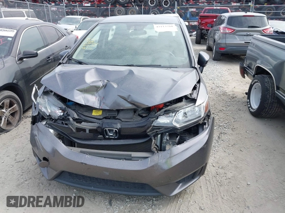 2016 Honda Fit LX with VIN JHMGK5H58GX034743, listed as a IAAI auction lot 42113760 with 98,283 mi miles and . Bid and sale history available at DreamBid. Image 12.