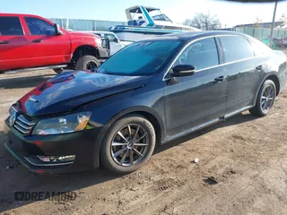 2015 Volkswagen Passat 1.8T Limited Edition with VIN 1VWAT7A37FC075800, listed as a IAAI auction lot 41856654 with 130,139 mi miles. Bid and sale history available at carsss.com. Image 2.