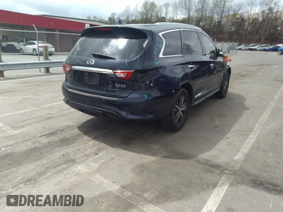 2016 Infiniti QX60 with VIN 5N1AL0MM0GC506599, listed as a IAAI auction lot 41921886 with 113,821 mi miles. Bid and sale history available at carsss.com. Image 4.