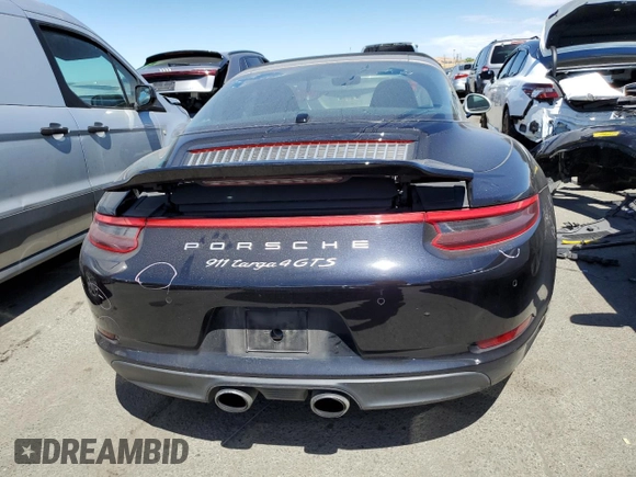 2019 Porsche 911 4S with VIN WP0BB2A99KS126019, listed as a Copart auction lot 60111334 with 25,012 mi miles and Salvage Title. Bid and sale history available at DreamBid. Image 6.