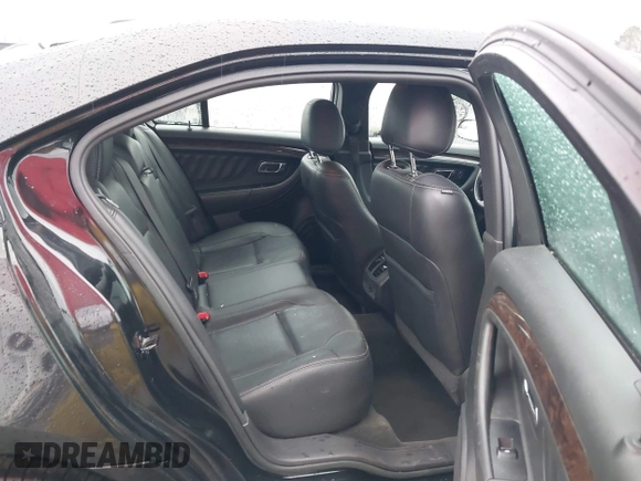 2015 Ford Taurus Limited with VIN 1FAHP2F87FG146554, listed as a IAAI auction lot 41712502 with 103,117 mi miles. Bid and sale history available at carsss.com. Image 8.