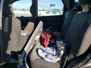 2004 Ford Escape XLS with VIN 1FMYU92134KA21707, listed as a Copart auction lot 72114804 with 219,518 mi miles and Salvage Title. Bid and sale history available at DreamBid. Image 11.