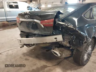 2016 Toyota Avalon Limited with VIN 4T1BK1EB3GU236479, listed as a IAAI auction lot 41370835 with 404,864 mi miles and . Bid and sale history available at carsss.com. Image 6.