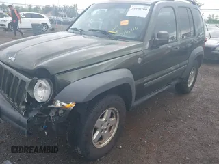 2006 Jeep Liberty Sport with VIN 1J4GL48K76W288408, listed as a IAAI auction lot 39990700 with 215,716 mi miles. Bid and sale history available at carsss.com. Image 6.