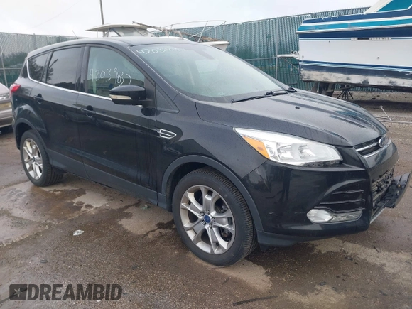 2013 Ford Escape SEL with VIN 1FMCU9H93DUC79592, listed as a IAAI auction lot 42039037 with 63,020 mi miles and . Bid and sale history available at DreamBid. Image 1.