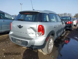 2015 MINI Countryman with VIN WMWZB3C56FWR46360, listed as a IAAI auction lot 41691359 with 88,305 mi miles and . Bid and sale history available at DreamBid. Image 4.
