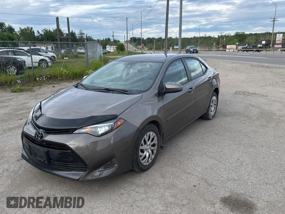 2019 Toyota Corolla L z VIN 2T1BURHE5KC220051, wystawiony jako Copart lot #61879415 z przebiegiem 196 200 mil mil oraz Czysty tytuł • Clean title. Historia ofert i sprzedaży dostępna na DreamBid. Obrazek 2.