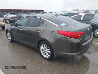 2013 Kia Optima EX z VIN 5XXGN4A79DG181719, wystawiony jako IAAI lot #42372478 z przebiegiem 166 410 mil mil oraz . Historia ofert i sprzedaży dostępna na DreamBid. Obrazek 14.
