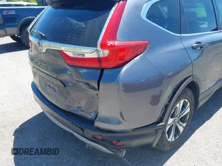 2018 Honda CR-V LX with VIN 5J6RW5H30JL001323, listed as a IAAI auction lot 42054162 with 91,238 mi miles. Bid and sale history available at carsss.com. Image 6.