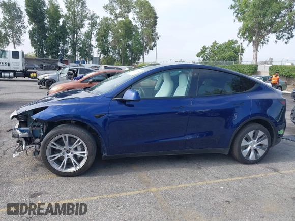 2023 Tesla Model Y Long Range z VIN 7SAYGDEE5PA102285, wystawiony jako IAAI lot #42402981 z przebiegiem 24 550 mil mil oraz . Historia ofert i sprzedaży dostępna na DreamBid. Obrazek 15.
