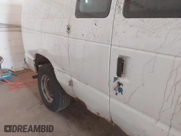 2011 Ford Econoline Cargo Commercial with VIN 1FTNE2EW9BDB11058, listed as a IAAI auction lot 42202069 with 282,179 mi miles. Bid and sale history available at carsss.com. Image 6.