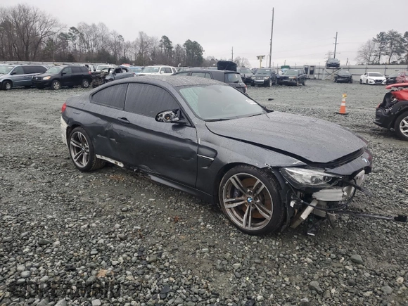 2015 BMW M4 with VIN WBS3R9C54FK330180, listed as a Copart auction lot 40706044 with 69,474 mi miles. Bid and sale history available at carsss.com. Image 4.