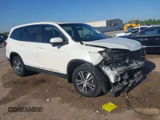 2017 Honda Pilot EX-L with VIN 5FNYF5H89HB018518, listed as a IAAI auction lot 41983800 with 161,622 mi miles and . Bid and sale history available at DreamBid. Image 1.