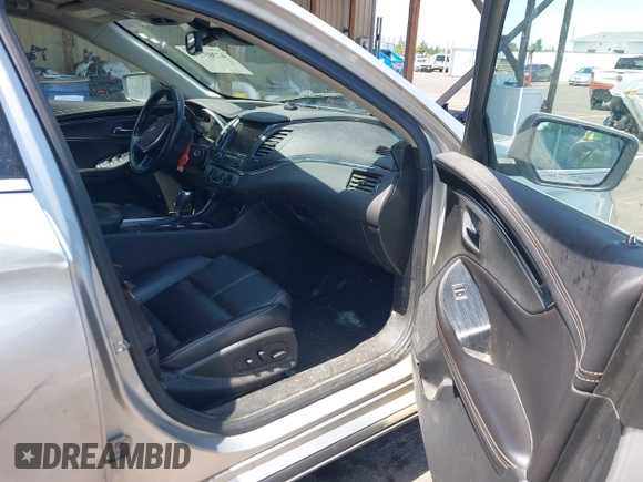 2017 Chevrolet Impala LT with VIN 2G1105S31H9197165, listed as a IAAI auction lot 42303730 with 232,046 mi miles and . Bid and sale history available at DreamBid. Image 5.
