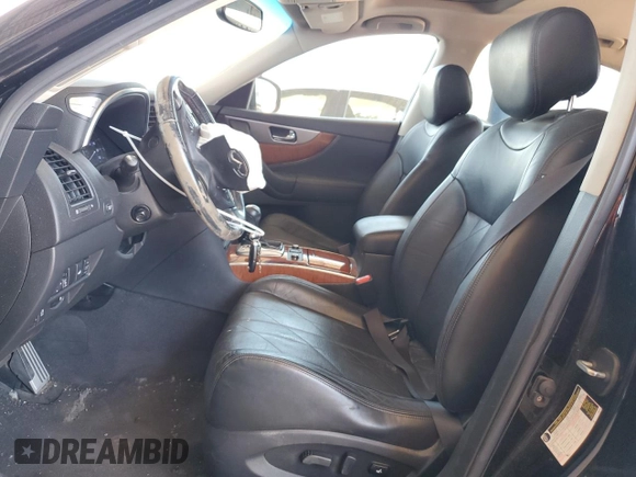 2015 Infiniti QX70 z VIN JN8CS1MW9FM481836, wystawiony jako Copart lot #57801425 z przebiegiem 130 011 mil mil oraz Szkoda całkowita • Salvage title. Historia ofert i sprzedaży dostępna na DreamBid. Obrazek 7.