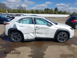 2021 Lexus UX 250h z VIN JTHP9JBH0M2039502, wystawiony jako IAAI lot #41868672 z przebiegiem 17 496 mil mil oraz . Historia ofert i sprzedaży dostępna na DreamBid. Obrazek 13.