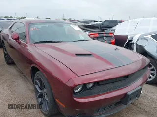 2019 Dodge Challenger SXT z VIN 2C3CDZAGXKH632914, wystawiony jako IAAI lot #42218764 z przebiegiem Nie podano mil oraz . Historia ofert i sprzedaży dostępna na DreamBid. Obrazek 1.