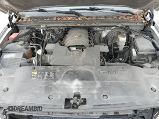 2015 GMC Yukon SLE with VIN 1GKS1AKC3FR260002, listed as a Copart auction lot 47590545 with 358,891 mi miles and Salvage Title. Bid and sale history available at carsss.com. Image 12.