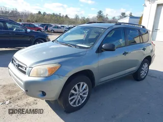 2008 Toyota RAV4 with VIN JTMBK33V486036696, listed as a IAAI auction lot 41718683 with 220,406 mi miles. Bid and sale history available at carsss.com. Image 2.