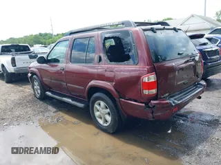 2002 Nissan Pathfinder SE z VIN JN8DR09Y52W737232, wystawiony jako IAAI lot #42381901 z przebiegiem 272 847 mil mil oraz . Historia ofert i sprzedaży dostępna na DreamBid. Obrazek 3.