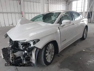 2013 Ford Fusion SE Hybrid with VIN 3FA6P0LU8DR357054, listed as a IAAI auction lot 42372168 with 143,979 mi miles and . Bid and sale history available at DreamBid. Image 17.