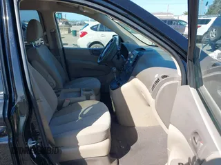 2010 Kia Sedona LX with VIN KNDMG4C34A6353639, listed as a IAAI auction lot 42200137 with 220,097 mi miles and . Bid and sale history available at carsss.com. Image 5.