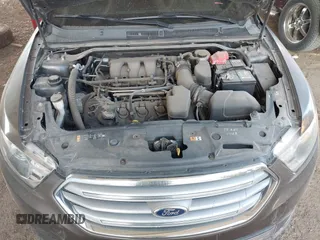 2015 Ford Taurus SEL with VIN 1FAHP2H87FG176103, listed as a IAAI auction lot 41950844 with 205,014 mi miles. Bid and sale history available at carsss.com. Image 10.
