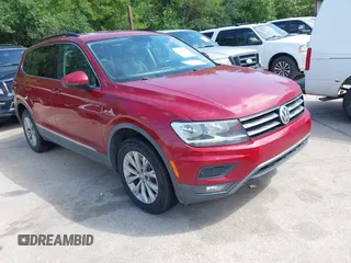 2018 Volkswagen Tiguan SEL z VIN 3VV3B7AX4JM027472, wystawiony jako IAAI lot #42398665 z przebiegiem 153 742 mil mil oraz . Historia ofert i sprzedaży dostępna na DreamBid. Obrazek 1.