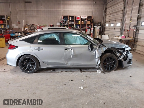 2023 Honda Civic Sport with VIN 19XFL2H80PE010679, listed as a IAAI auction lot 42026973 with 25,701 mi miles and . Bid and sale history available at DreamBid. Image 13.