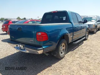 2001 Ford F-150 XLT with VIN 1FTRW07W01KA75819, listed as a IAAI auction lot 42293859 with 156,137 mi miles and . Bid and sale history available at DreamBid. Image 4.