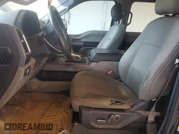 2015 Ford F-150 XLT with VIN 1FTEW1EF0FFA69722, listed as a Copart auction lot 59671695 with 189,690 mi miles and Salvage title. Bid and sale history available at DreamBid. Image 7.