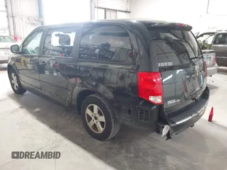 2013 Dodge Grand Caravan SXT with VIN 2C4RDGCG2DR527482, listed as a IAAI auction lot 42199622 with 198,248 mi miles and . Bid and sale history available at DreamBid. Image 3.