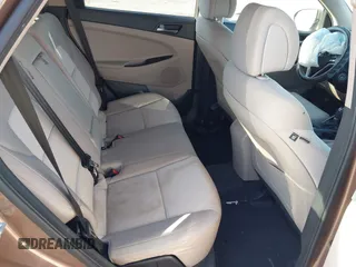 2017 Hyundai Tucson SE with VIN KM8J23A40HU525982, listed as a IAAI auction lot 41790898 with 107,715 mi miles. Bid and sale history available at carsss.com. Image 8.
