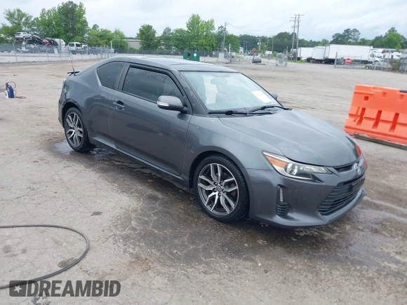 2015 Scion tC z VIN JTKJF5C75F3089895, wystawiony jako IAAI lot #42226465 z przebiegiem 106 694 mil mil oraz . Historia ofert i sprzedaży dostępna na DreamBid. Obrazek 1.