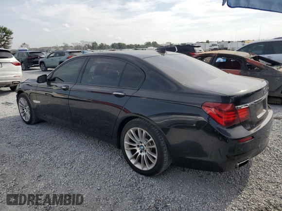 2014 BMW 7 Series 740Li with VIN WBAYE4C52ED138770, listed as a Copart auction lot 53647665 with 106,827 mi miles and Salvage title. Bid and sale history available at DreamBid. Image 2.