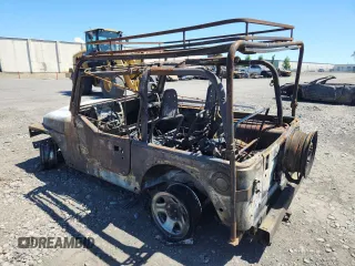 2000 Jeep Wrangler SE with VIN 1J4FA29P2YP797531, listed as a Copart auction lot 56058845 with Not provided miles and Salvage title. Bid and sale history available at DreamBid. Image 2.