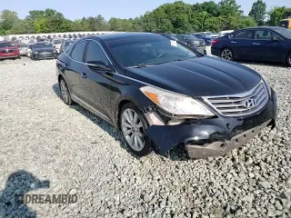 2013 Hyundai Azera с VIN KMHFH4JG2DA266282, выставлен на аукционе Copart как лот 59156175 с пробегом 135 013 миль миль и Списание • Salvage title. История ставок и продаж доступна на DreamBid. Изображение 13.