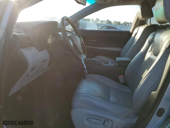 2011 Lexus RX 450h with VIN JTJZB1BA4B2405599, listed as a Copart auction lot 74988634 with 176,133 mi miles and Salvage Title. Bid and sale history available at carsss.com. Image 7.