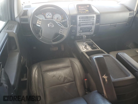 2010 Nissan Titan LE with VIN 1N6BA0EC2AN318776, listed as a Copart auction lot 46702485 with 111,149 mi miles and Salvage Title. Bid and sale history available at carsss.com. Image 8.